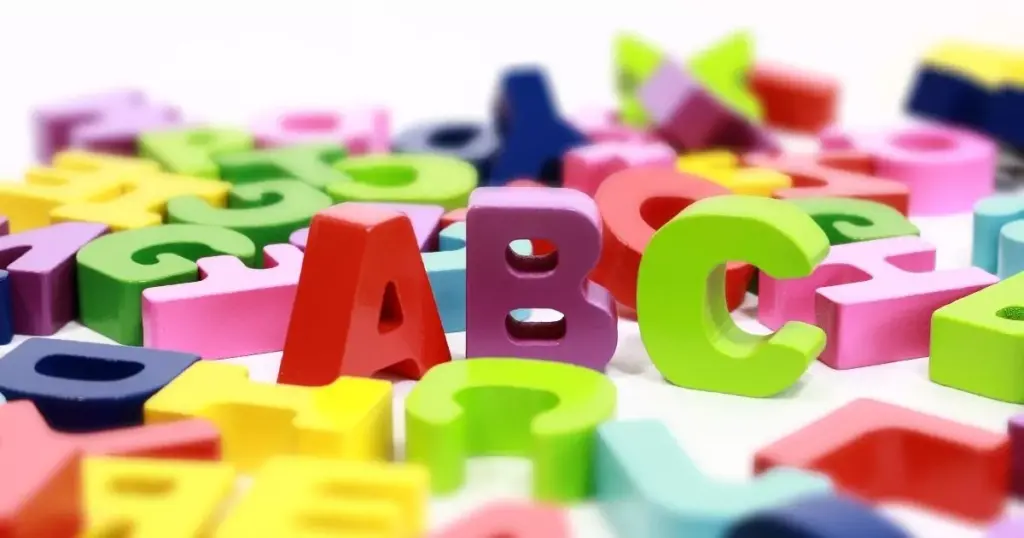 What is synthetic phonics blog image. Children's toy letters